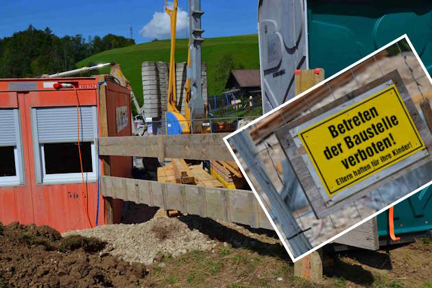 Baucontainer, Kran, Zaun mit Tafel Betreten der Baustelle verboten