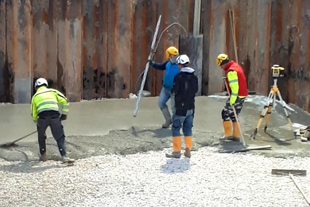 Ausbreiten einer Beton-Sauberkeitsschicht